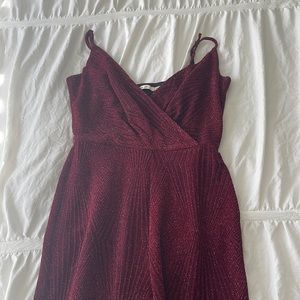 Red jumpsuit with glitter